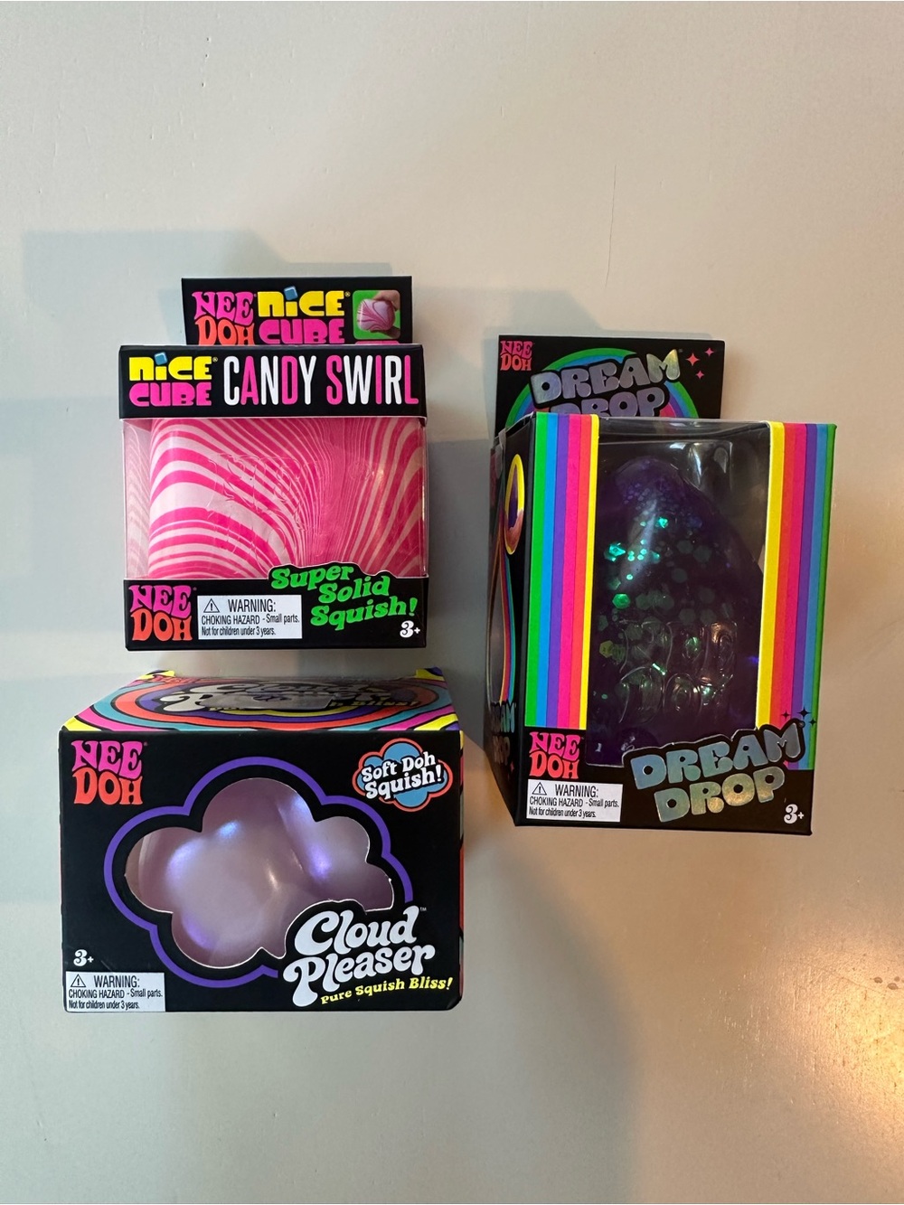NeeDoh Kids Squish Toy Trio - candy swirl, cloud pleaser and dream drop